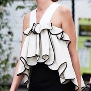STYLEWE Asymmetrical Ruffled Sleeveless Blouse in White and Black